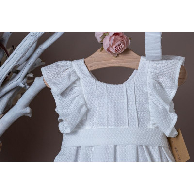 Christening dress white color from a special fabric