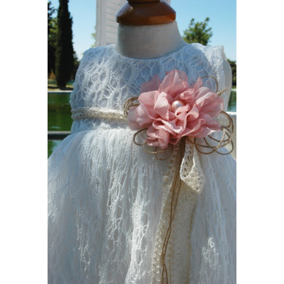 Romantic baptismal gown of white cotton lace